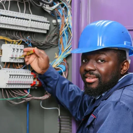 depositphotos_328265486-stock-photo-african-american-electrician-performing-wiring